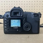 Cámara réflex digital Canon EOS D60 de 6,3 MP, objetivo Sigma F2.8 de 90 mm y batería (Grado C).