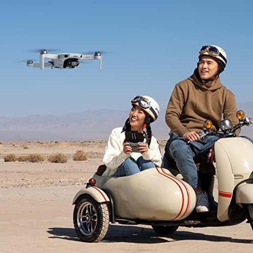 DJI Mini 4K Camera Drone Combo  Drone with 4K UHD Camera for Adults  Under 249 g  3 Axis Gimbal Stabilization  10km Video Transmission  Auto Return  2 Batteries for 62 Min Max Flight Time  QuickShots