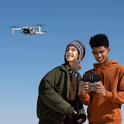 DJI Mini 4K Fly More Combo  Drone with 4K UHD Camera for Adults  Under 249 g  3 Axis Gimbal Stabilization  10km Video Transmission  Auto Return  3 Batteries for 93 Min Max Flight Time  QuickShots