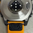 Reloj inteligente Garmin Fenix ​​8 de 47 mm con pantalla AMOLED de zafiro y titanio, color naranja brillante y grafito