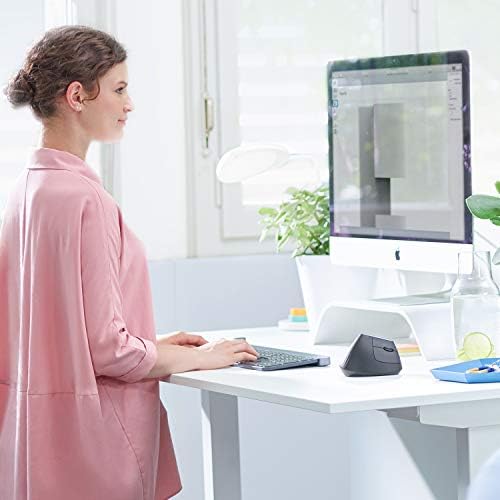 Logitech MX Vertical Wireless Mouse   Ergonomic Design Reduces Muscle Strain  Move Content Between 3 Windows and Apple Computers  Rechargeable  Graphite