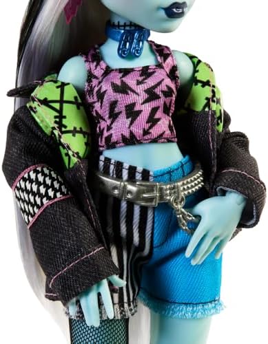 Monster High Frankie Stein Doll in Denim Jacket and Shorts  Includes Pet Dog Watzie and Accessories Like a Backpack  Snack and Notebook