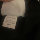 Sudadera deportiva Nike para mujer, color negro, con cremallera de un cuarto, tecnología DRI-FIT, protección UV, talla M, nueva, CW7267-017, $65