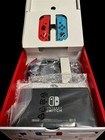 Nintendo Switch Console HDMI w/ Neon Red & Blue Controllers  Brand New  Sealed 