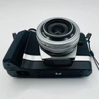 OLYMPUS Mirrorless Camera OM D E M10 with ED 14 42mm F3 5 5 6 EZ Lens Kit Silver