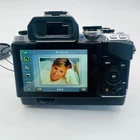 OLYMPUS Mirrorless Camera OM D E M10 with ED 14 42mm F3 5 5 6 EZ Lens Kit Silver