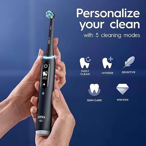 Oral B iO Deep Clean   Protect Rechargeable Electric Toothbrush  Black with a iO Series 7 Toothbrush  2 Replacement Brush Heads  and a Charging Travel Case