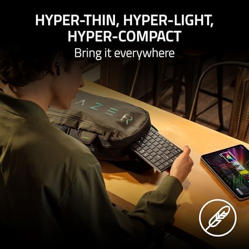 Razer Joro Portable Wireless Gaming Keyboard  Thin  Light  Compact   Chroma RGB   Low Profile Switches   Bluetooth   Long Battery Life   Snap Tap   For PC & Mac Laptops  Steam Deck  Smartphone  Tablet