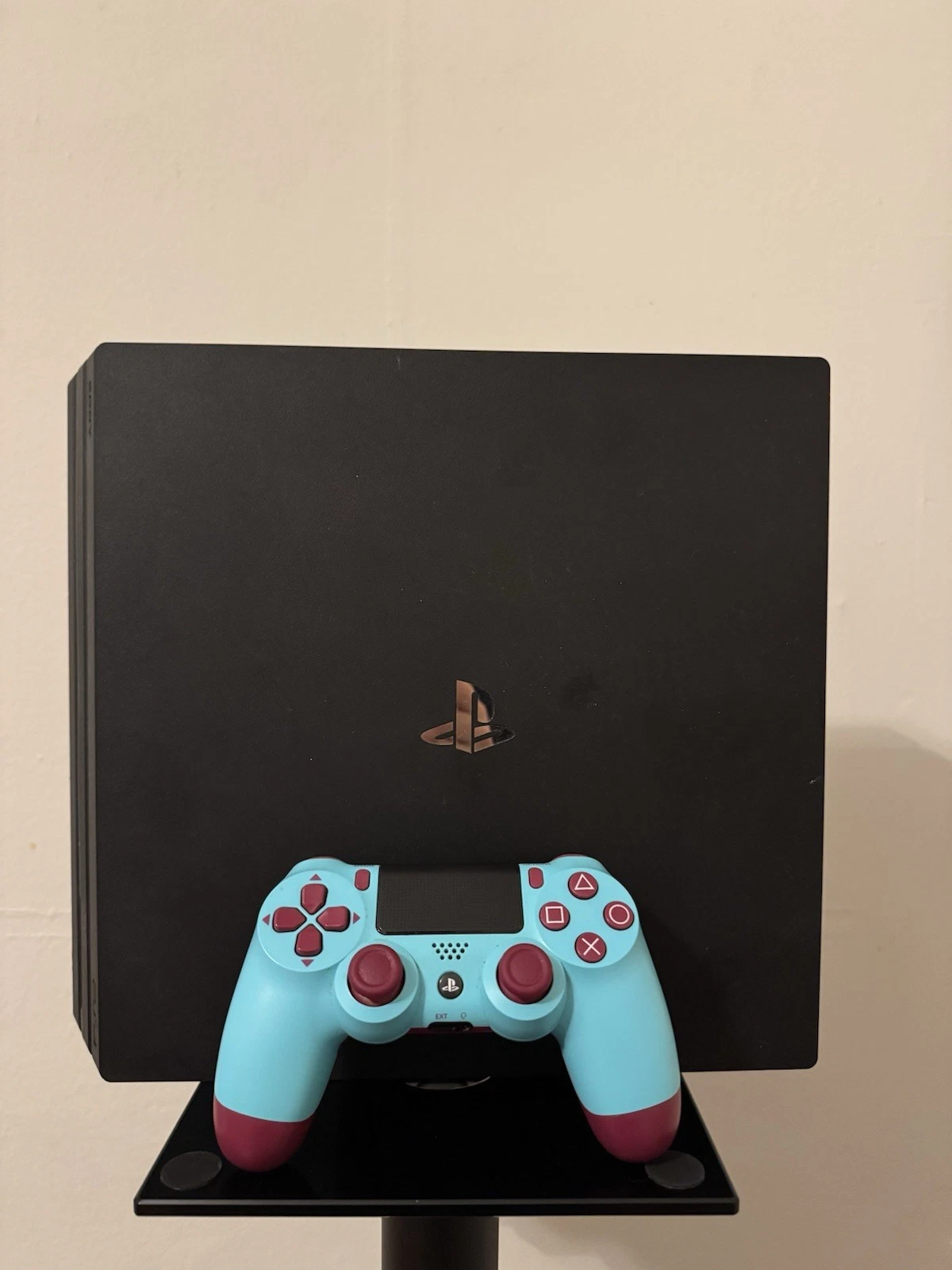 Sony PlayStation 4 Pro 1TB Console with Berry Blue Dualshock 4 Controller