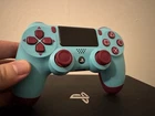 Sony PlayStation 4 Pro 1TB Console with Berry Blue Dualshock 4 Controller