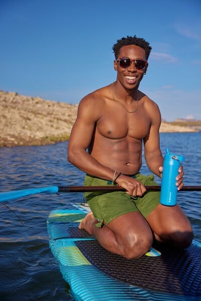 STANLEY - Botella de agua IceFlow Flip Straw 2.0 con pajilla abatible, abertura más grande, acero inoxidable aislado, sin bisfenol A, 36 onzas, liviana y antiderrames, color verde Meadow