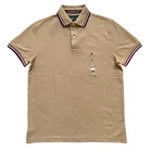 Polo Tommy Hilfiger de secado rápido con protección UV y ribete de rayas para hombre