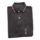 Polo Tommy Hilfiger de secado rápido con protección UV y ribete de rayas para hombre