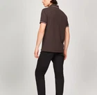 Polo Tommy Hilfiger de secado rápido con protección UV y ribete de rayas para hombre