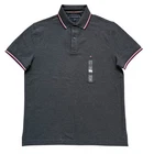 Polo Tommy Hilfiger de secado rápido con protección UV y ribete de rayas para hombre