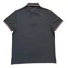 Polo Tommy Hilfiger de secado rápido con protección UV y ribete de rayas para hombre