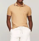 Polo Tommy Hilfiger de secado rápido con protección UV y ribete de rayas para hombre