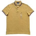 Polo Tommy Hilfiger de secado rápido con protección UV y ribete de rayas para hombre