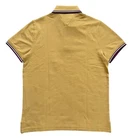 Polo Tommy Hilfiger de secado rápido con protección UV y ribete de rayas para hombre