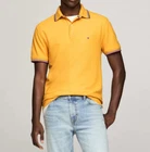 Polo Tommy Hilfiger de secado rápido con protección UV y ribete de rayas para hombre