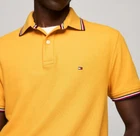 Polo Tommy Hilfiger de secado rápido con protección UV y ribete de rayas para hombre