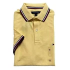 Polo Tommy Hilfiger de secado rápido con protección UV y ribete de rayas para hombre
