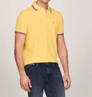 Polo Tommy Hilfiger de secado rápido con protección UV y ribete de rayas para hombre