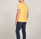 Polo Tommy Hilfiger de secado rápido con protección UV y ribete de rayas para hombre