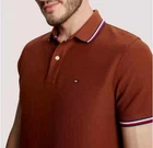 Polo Tommy Hilfiger de secado rápido con protección UV y ribete de rayas para hombre