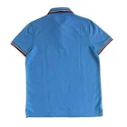 Polo Tommy Hilfiger de secado rápido con protección UV y ribete de rayas para hombre