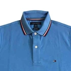 Polo Tommy Hilfiger de secado rápido con protección UV y ribete de rayas para hombre