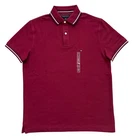 Polo Tommy Hilfiger de secado rápido con protección UV y ribete de rayas para hombre