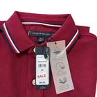Polo Tommy Hilfiger de secado rápido con protección UV y ribete de rayas para hombre