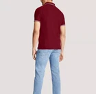 Polo Tommy Hilfiger de secado rápido con protección UV y ribete de rayas para hombre