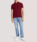 Polo Tommy Hilfiger de secado rápido con protección UV y ribete de rayas para hombre