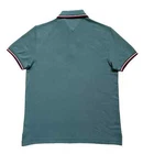 Polo Tommy Hilfiger de secado rápido con protección UV y ribete de rayas para hombre