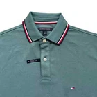 Polo Tommy Hilfiger de secado rápido con protección UV y ribete de rayas para hombre