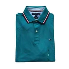 Polo Tommy Hilfiger de secado rápido con protección UV y ribete de rayas para hombre