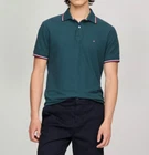 Polo Tommy Hilfiger de secado rápido con protección UV y ribete de rayas para hombre