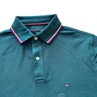 Polo Tommy Hilfiger de secado rápido con protección UV y ribete de rayas para hombre