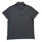 Polo Tommy Hilfiger de secado rápido con protección UV y ribete de rayas para hombre