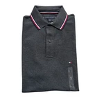 Polo Tommy Hilfiger de secado rápido con protección UV y ribete de rayas para hombre