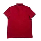 Polo Tommy Hilfiger de secado rápido con protección UV y ribete de rayas para hombre