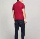 Polo Tommy Hilfiger de secado rápido con protección UV y ribete de rayas para hombre