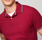 Polo Tommy Hilfiger de secado rápido con protección UV y ribete de rayas para hombre