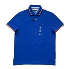 Polo Tommy Hilfiger de secado rápido con protección UV y ribete de rayas para hombre