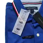 Polo Tommy Hilfiger de secado rápido con protección UV y ribete de rayas para hombre