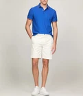 Polo Tommy Hilfiger de secado rápido con protección UV y ribete de rayas para hombre