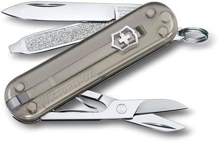 Victorinox Classic SD Swiss Army Knife  Compact 7 Function Swiss Made Pocket Knife with Small Blade  Screwdriver and Key Ring   Camo