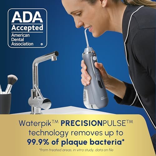 Waterpik Cordless Advanced 2 0 Water Flosser For Teeth  Gums  Braces  Dental Care With Travel Bag and 4 Tips  ADA Accepted  Rechargeable  Portable  and Waterproof  Gray WP 587  Packaging May Vary
